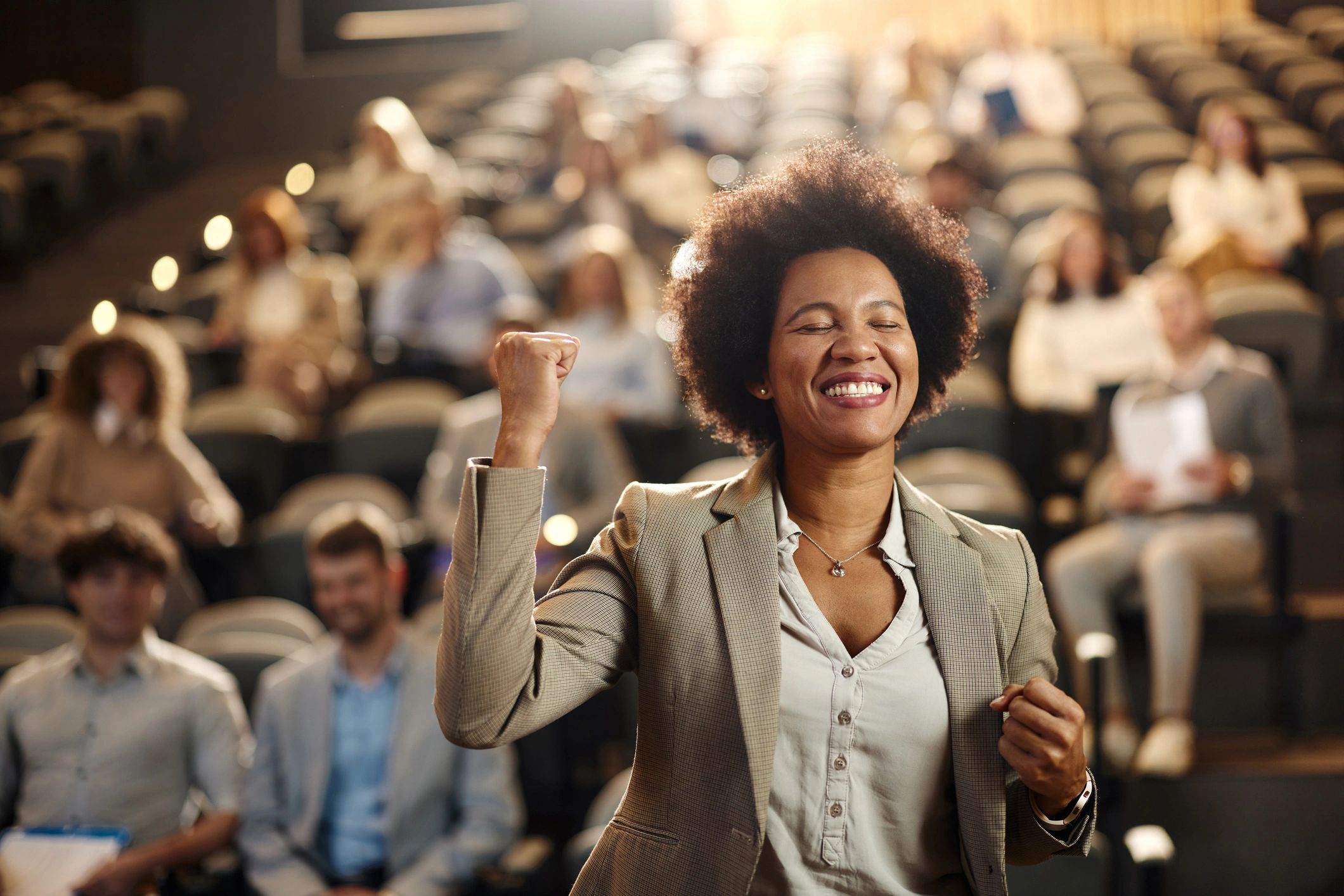 happy school administrator theater